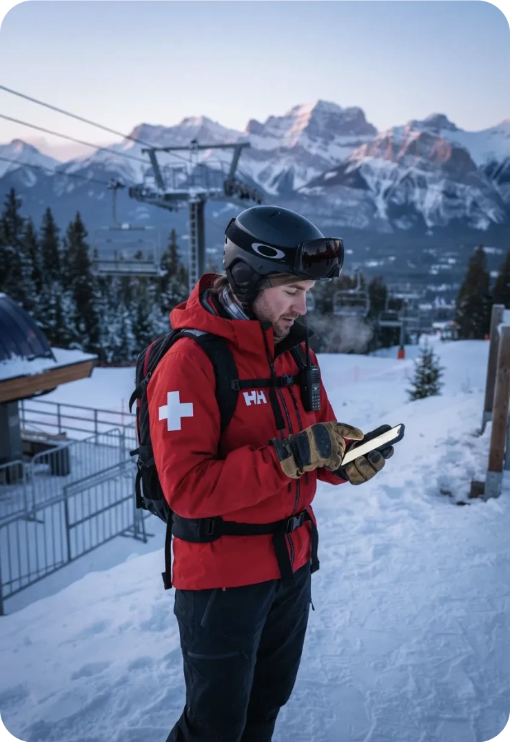 Ski patroller on a snowy slope